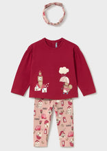 Load image into Gallery viewer, A children's two-piece top and leggings set with a long-sleeve top and matching pants, plus a matching headband, shown on a white background. The top is deep red with cartoon house and mouse illustrations, while the pants and headband are light pink with a red house pattern. available on kidstuff.ie