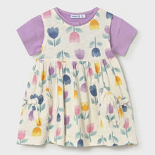 Load image into Gallery viewer, Baby dress with floral pattern and lilac cardigan worn underneath . Mayoral 1922 baby dress set available to buy on kidstuff.ie