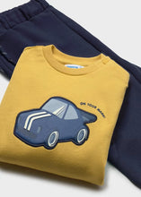 Load image into Gallery viewer, A folded mustard yellow sweatshirt with a navy blue car graphic and the text 'ON YOUR MARK' laid over a pair of navy pants