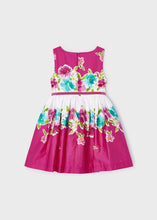 Load image into Gallery viewer, Girl's sleeveless, belted summer dress in fuchsia pink floral border print . Girl's cerise pink dress available to buy on kidstuff.ie. Mayoral dress 3921 Back view