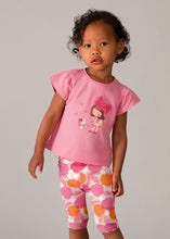 Load image into Gallery viewer, Child wearing a pink shirt with a cartoon character design and printed capri leggings . Mayoral 1751 girl's 2 piece outfit available to buy on kidstuff.ie
