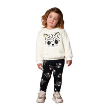 Load image into Gallery viewer, Milon girl's black and winter-white sweatshirt and leggings outfit with a pussycat motif. This cosy top is fully lined in cotton jersey. The outer layer is the softest plush fur fabric with a cute cat face embroidered on the front in black and white with gold ears and a bobble nose. The stretchy leggings are black with a white pussycat print all-over and an elasticated waist for comfort. Made by Milon and available on kidstuff.ie