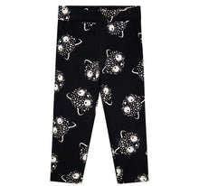 Load image into Gallery viewer, Milon girl's black and winter-white sweatshirt and leggings outfit with a pussycat motif. This cosy top is fully lined in cotton jersey. The outer layer is the softest plush fur fabric with a cute cat face embroidered on the front in black and white with gold ears and a bobble nose. The stretchy leggings are black with a white pussycat print all-over and an elasticated waist for comfort. Made by Milon and available on kidstuff.ie Leggings