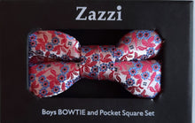 Load image into Gallery viewer, Boy's bow tie and pocket square in pink brocade patterned with tiny light blue flowers and deeper pink leaves. The necktie is on an adjustable band for a comfortable fit from about 7 years to 14 years and has a hook and bar fastening. Suitable for special occasions including First Communions and weddings