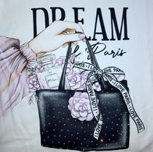 Load image into Gallery viewer, Girl's long-sleeved white top with a chic, sparkly print on the front in purple and navy tones teamed with a pair of stretchy leggings in navy. The leggings are trimmed down the side-legs by ribbon with the legend "I Love Paris" and have an elasticated waist for comfort. The top has a round neckline and a curved hem, slightly longer on the back. Made by Milon 13537 and available on Kidstuff.ie