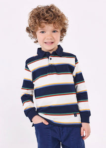 Long sleeved, polo shirt in dark navy and winter white wide stripes edged with green, red, blue and yellow narrow stripes.  Woven navy collar. Button opening to centre front. Mayoral 4102 available on kidstuff.ie