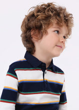 Load image into Gallery viewer, Long sleeved, polo shirt in dark navy and winter white wide stripes edged with green, red, blue and yellow narrow stripes.  Woven navy collar. Button opening to centre front. Mayoral 4102 Boys top available on kidstuff.ie
