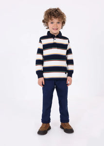 Long sleeved, polo shirt in dark navy and winter white wide stripes edged with green, red, blue and yellow narrow stripes. Woven navy collar. Button opening to centre front. Mayoral 4102 Boys top available on kidstuff.ie