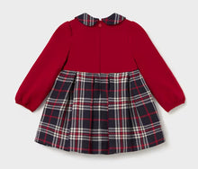 Load image into Gallery viewer, A long-sleeve children's dress with a solid red bodice and a pleated plaid skirt in navy, red, and white, featuring a matching plaid collar.
