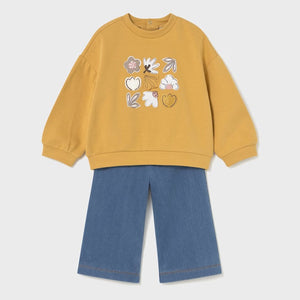Girl's yellow sweatshirt with floral designs and denim blue pants. Mayoral 2594 girl's set avalable on kistuff.ie
