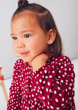 Load image into Gallery viewer, Child wearing a Red long sleeved dress with cream polka dots.  Mayoral 2915 girl&#39;s dress available on kidstuff.ie

