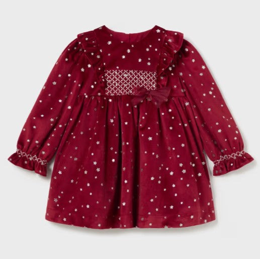 Red velvet dress with star print and long sleeves. Mayoral 2904 baby velvet dress available n kidstuff.ie