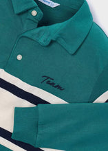 Load image into Gallery viewer, Close-up of a teal long-sleeve polo shirt with white and navy blue stripes and 'Team' embroidered on the chest.
