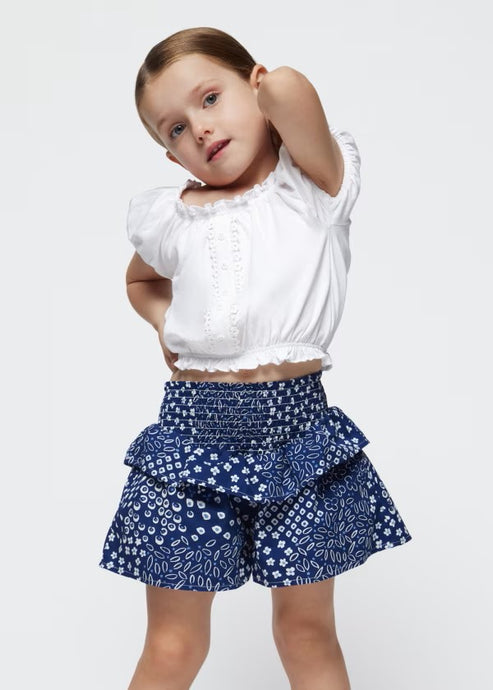 White gypsy top and printed culotte shorts for a girl. Mayoral 3260 girl's outfit available on kidstuff.ie