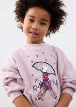 Load image into Gallery viewer, Child wearing a pink sweatshirt with a graphic umbrella design on a white background

