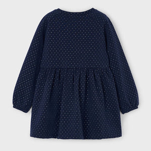 Girls dress in navy with polka dot print . Matching handbag. Mayoral 4926 available on kidstuff.ie Back view