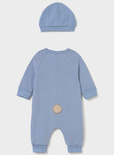 Load image into Gallery viewer, A baby's light blue two-piece outfit set consisting of a long-sleeve footless jumpsuit and a matching beanie hat, shown from the back 
