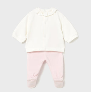 Back view of Baby girl's outfit with cream top with embroidered polka-dots and matching pink pants with feet in. Mayoral  2555 baby outfit available on kidstuff.ie