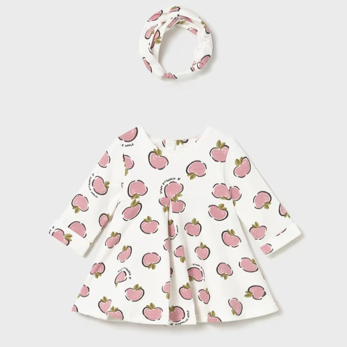 Baby dress with pink apple pattern on cream and matching headband . Mayoral 2827 baby dress se available on kidstuff.ie