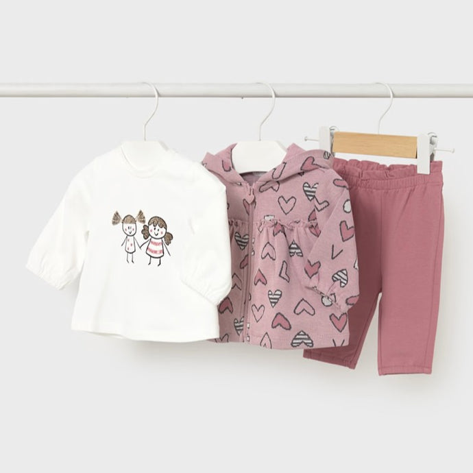 Baby girl's clothing set with a cream shirt, pink heart-patterned jacket with hood, and pink pants. Mayoral 2633 available on kidstuff.ie