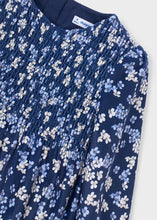 Load image into Gallery viewer, close up of printed velvet dress for a girl in nav blue, light blue and cream with shirring detail on the bodice, long sleeves 
