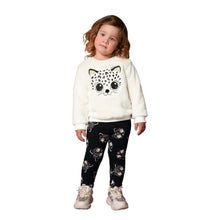 Load image into Gallery viewer, Milon girl&#39;s black and winter-white sweatshirt and leggings outfit with a pussycat motif. This cosy top is fully lined in cotton jersey. The outer layer is the softest plush fur fabric with a cute cat face embroidered on the front in black and white with gold ears and a bobble nose. The stretchy leggings are black with a white pussycat print all-over and an elasticated waist for comfort. Made by Milon and available on kidstuff.ie
