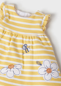 Striped banana-yellow and white baby dress with daisy and bumble dee embroidery. Mayoral 1855 baby dress in yellow. baby . Jersey dress for a baby girl in lemon yellow. close detail