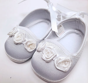 White satin baby shoes with ribbon roses. Baby Girl's christening shoes. Baby Booties