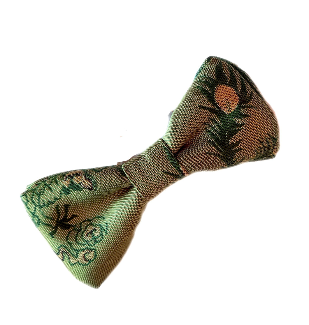 Green brocade bow tie with an elastic band.