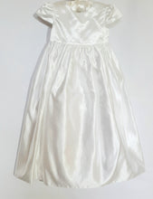 Load image into Gallery viewer, A beautiful three piece Christening outfit comprising a simple white satin gown with cap sleeves, an embroidered organza lace effect &quot;coat&quot; to wear over it, and a matching bonnet. The &quot;coat&quot;  has puff sleeves decorated with bows. It is fastened with pearl buttons and loops and is edged in guipure style lace trimming. The bonnet is fastened with velcro and is edged with a pretty organza frill.
