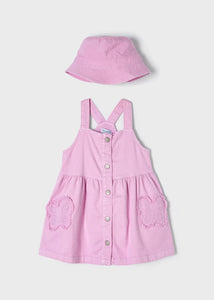 Pink dress and hat set. Mayoral 3907 Dungaree style dress and hat for a girl. Mauve pinafore and sunhat set for a girl.