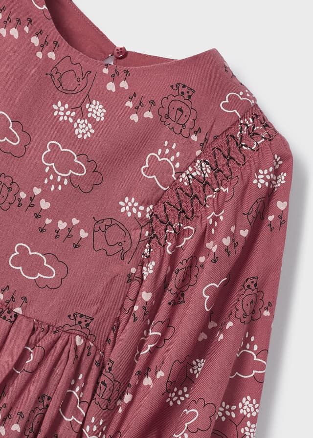 Girl's long sleeved, pink printed dress with smocking detail. mayoral 4970 Dress available on kidstuff.ie Dress detail with smocking.
