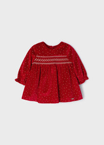 Baby girl's red velvet dress with long sleeves and smocking detail. Mayoral 2808 red velvet dress. Available on kidstuff.ie Christmas dress.